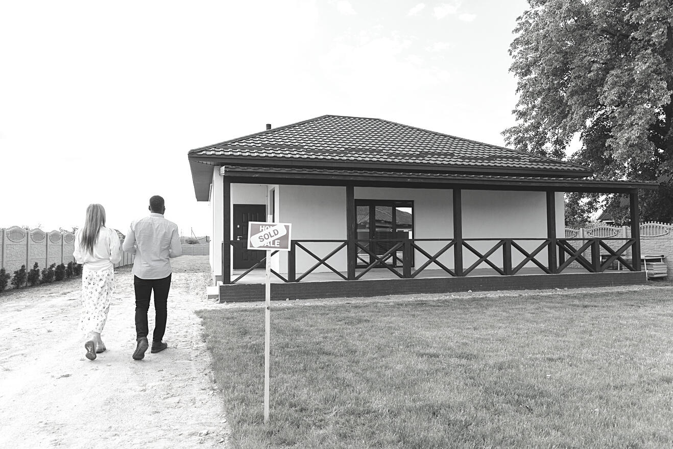 Couple Walking towards Their New House